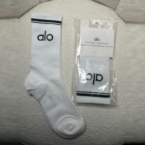 Unisex half-crew socks in white with black stripe